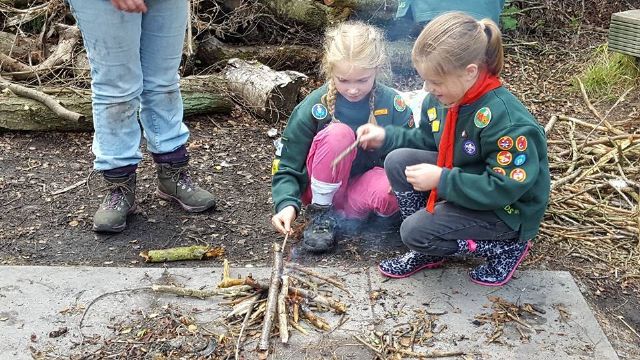 Cubs learning fire skills on camp